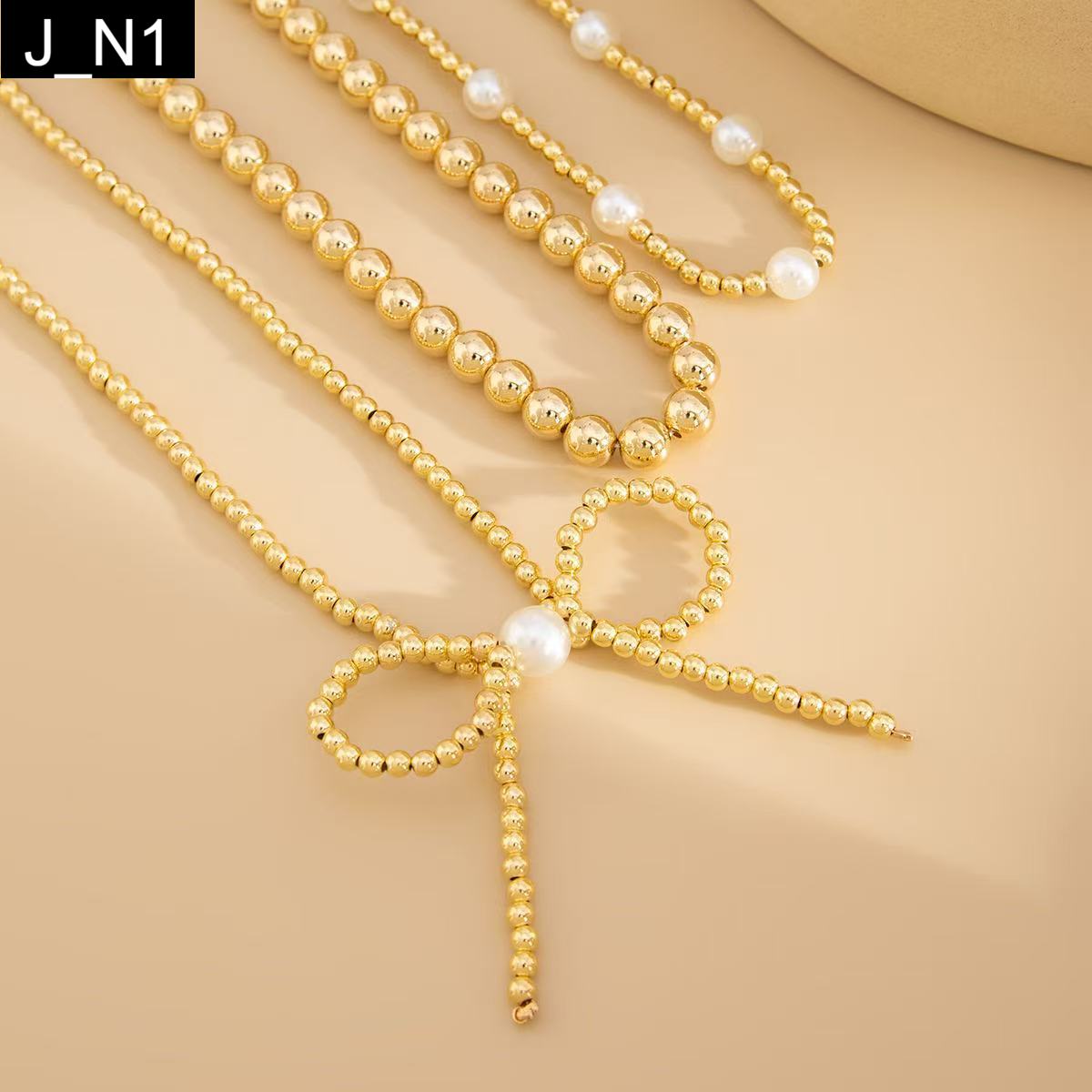 Midas Bow Necklace