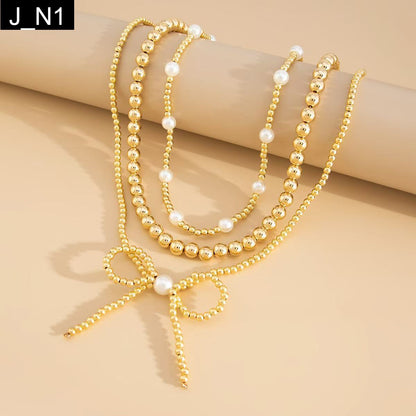 Midas Bow Necklace