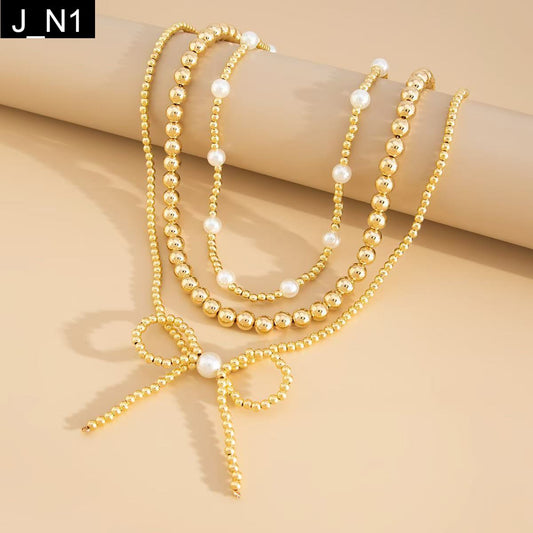 Midas Bow Necklace
